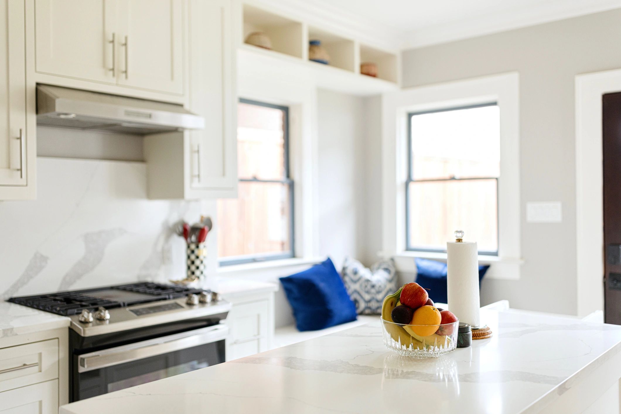 Quartz countertop and sink detail in a bright kitchen